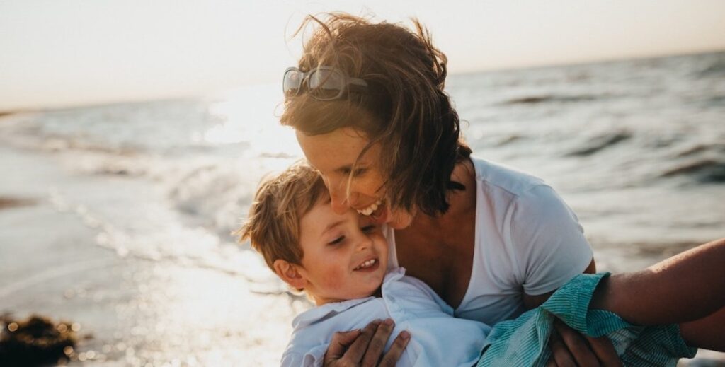 Mother and son on beach